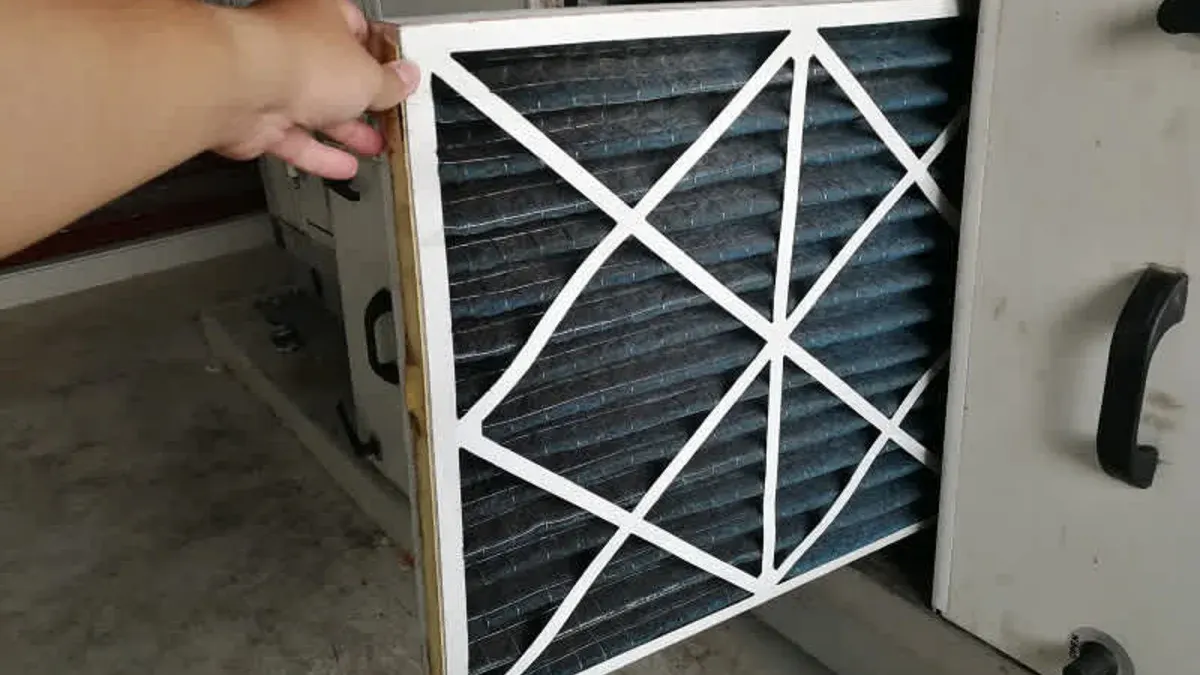 Home HVAC air filter being replaced